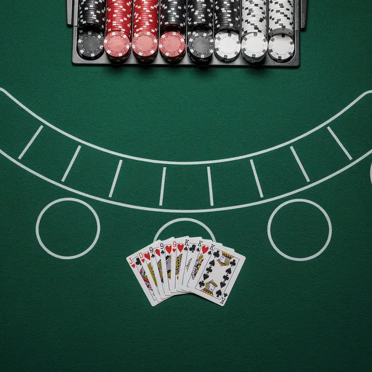 Casino Blackjack Table with Cards and Chips