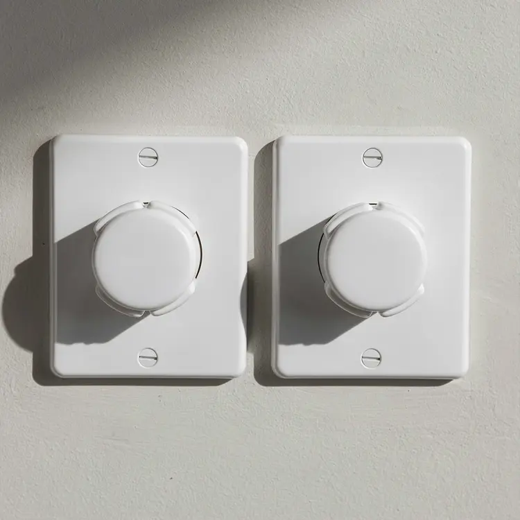 Childproof Outlet Safety Covers on Wall