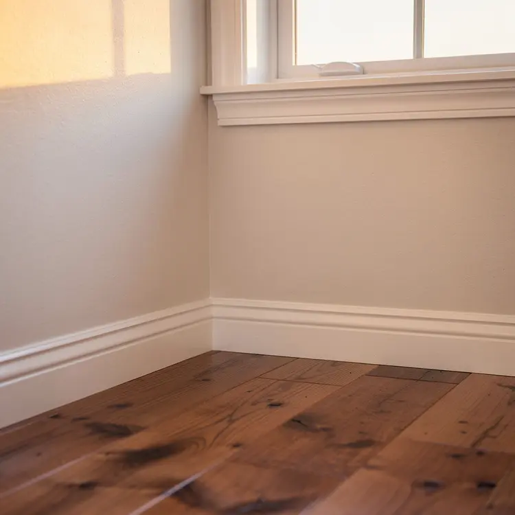 Freshly Renovated Interior Room Corner with Hardwood Floors