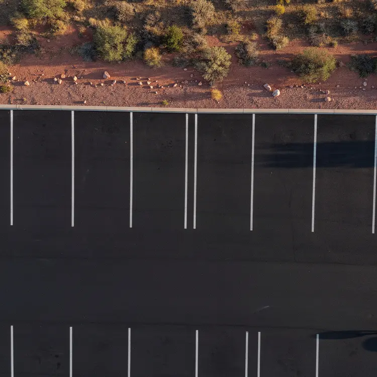 Freshly Paved Desert Parking Lot Aerial View
