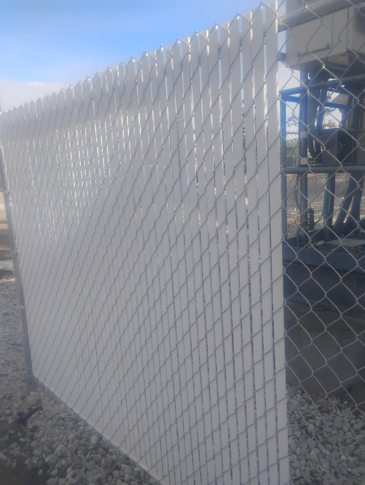 Chain Link Fence with Gray Privacy Slats