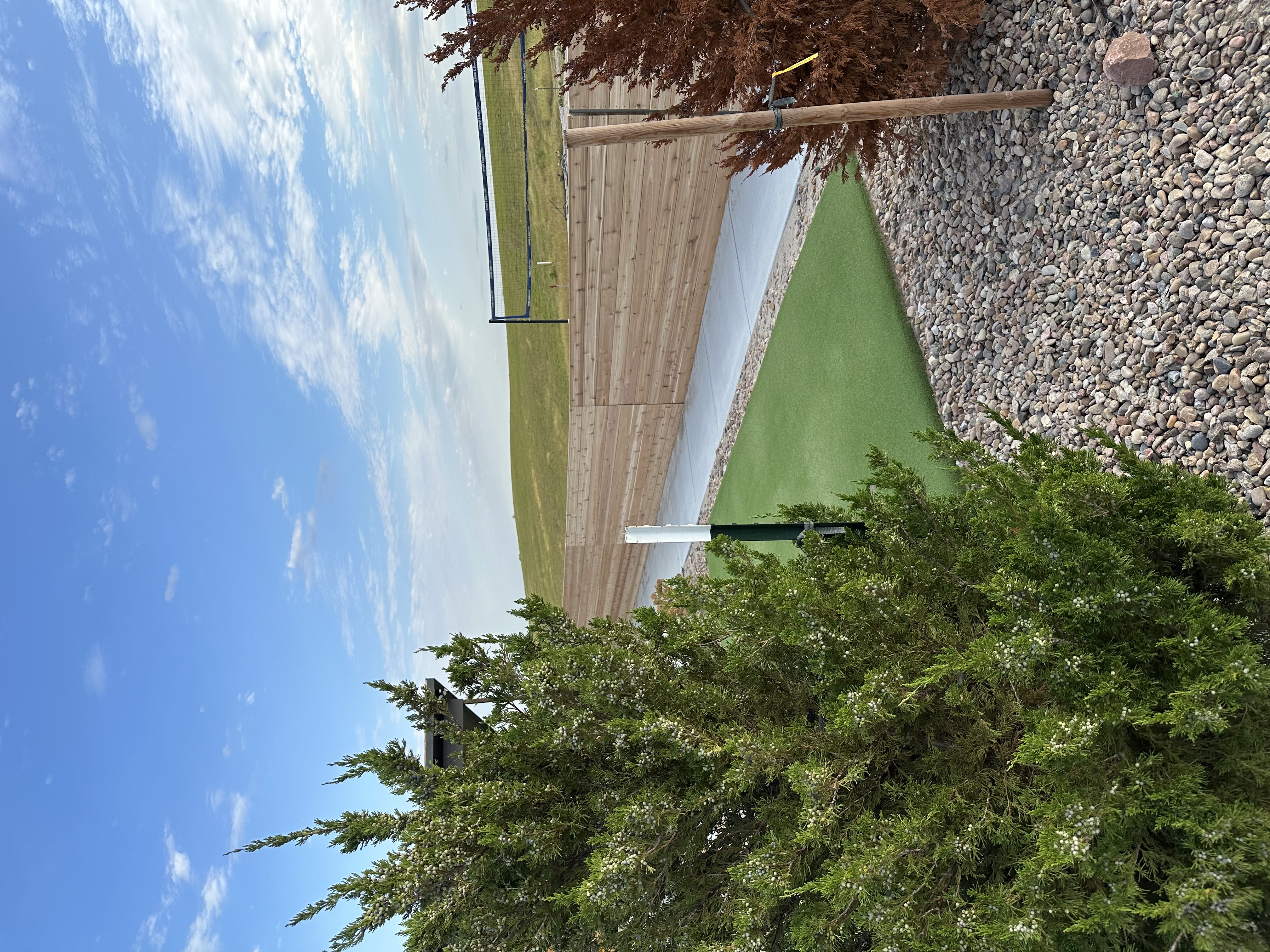 Cedar Horizontal Wood Fence with Backyard Putting Green