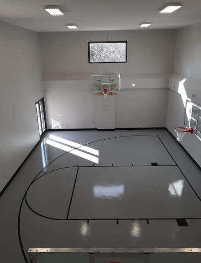 Indoor Basketball Court with High-Gloss Concrete Floor Coating