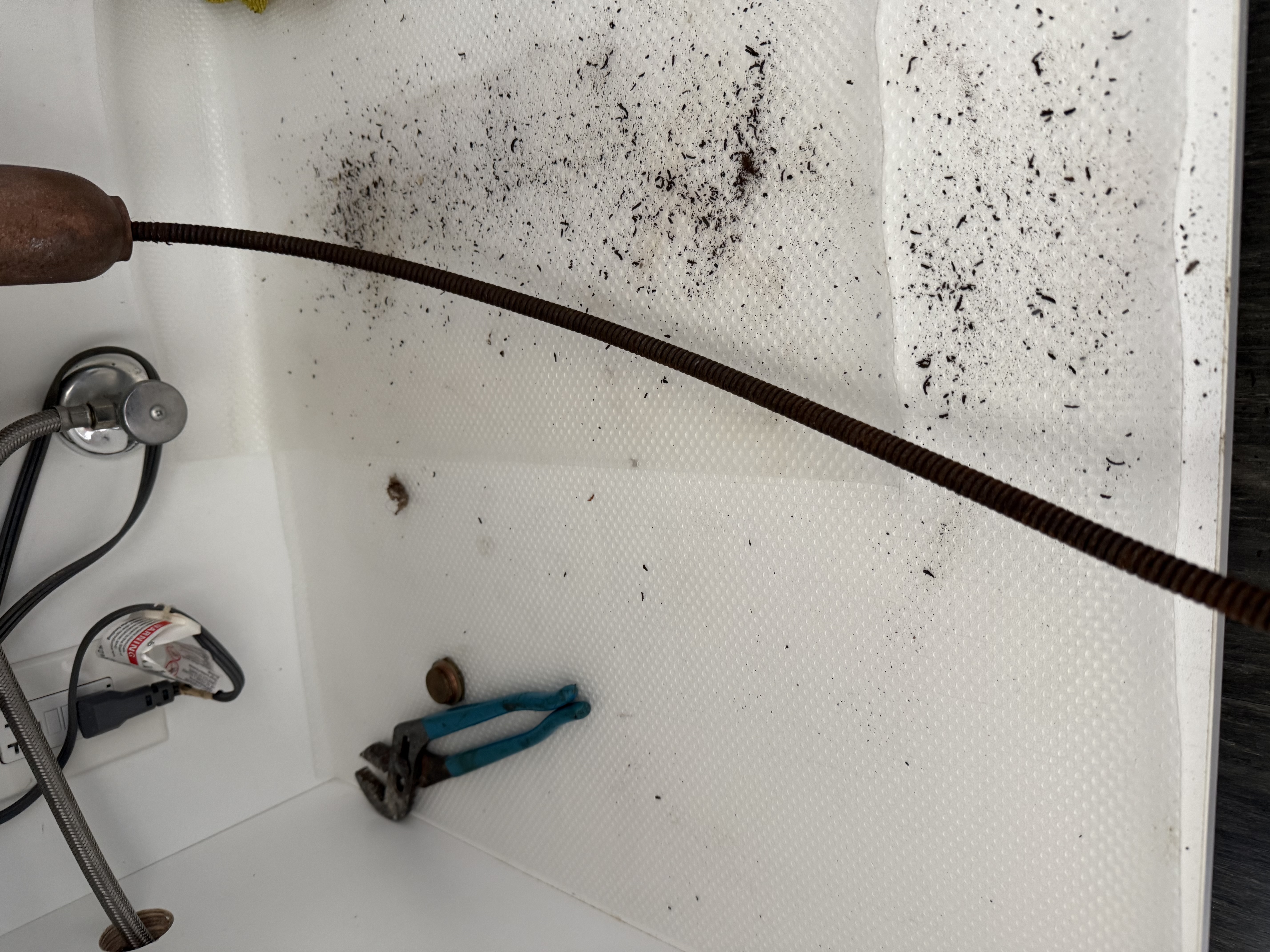 Drain Snake Auger After Clearing a Clogged Drain