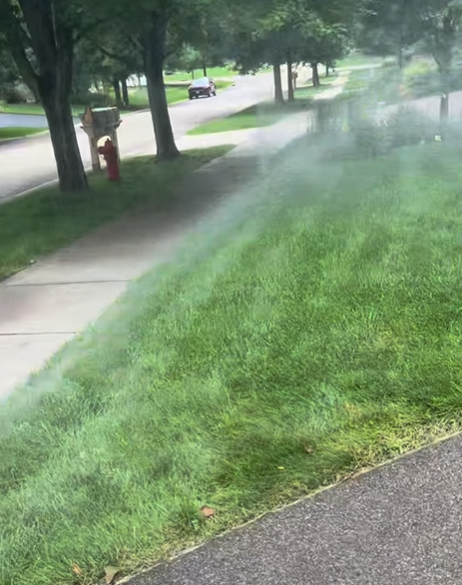 Residential Lawn Sprinkler System in Action
