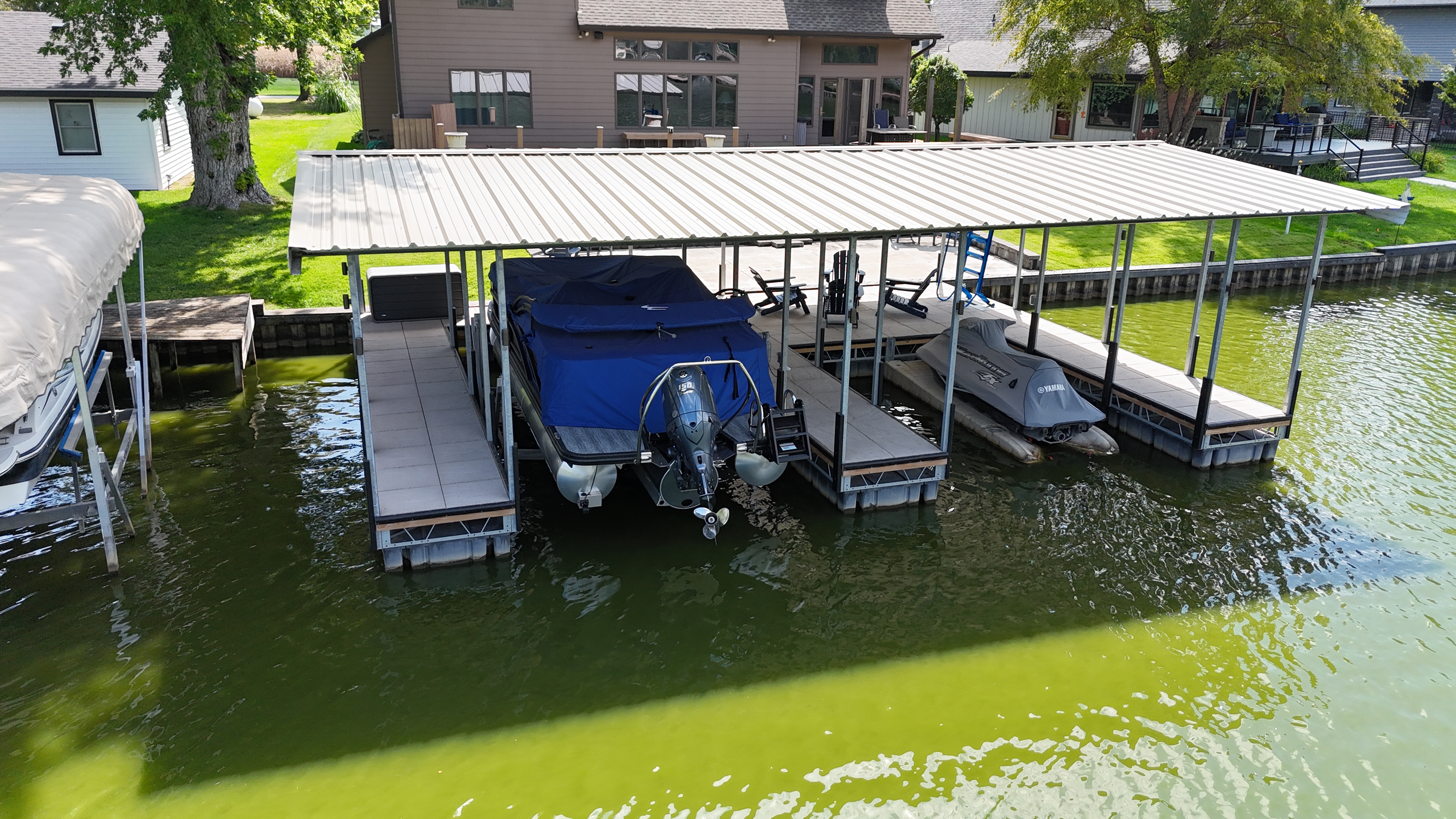 Covered Pontoon Dock & PWC Lift Installation