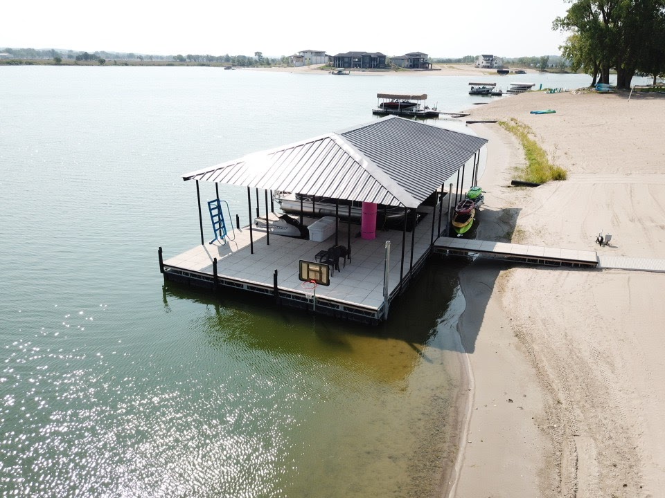 Custom Covered Floating Dock with Dual Boat Slips