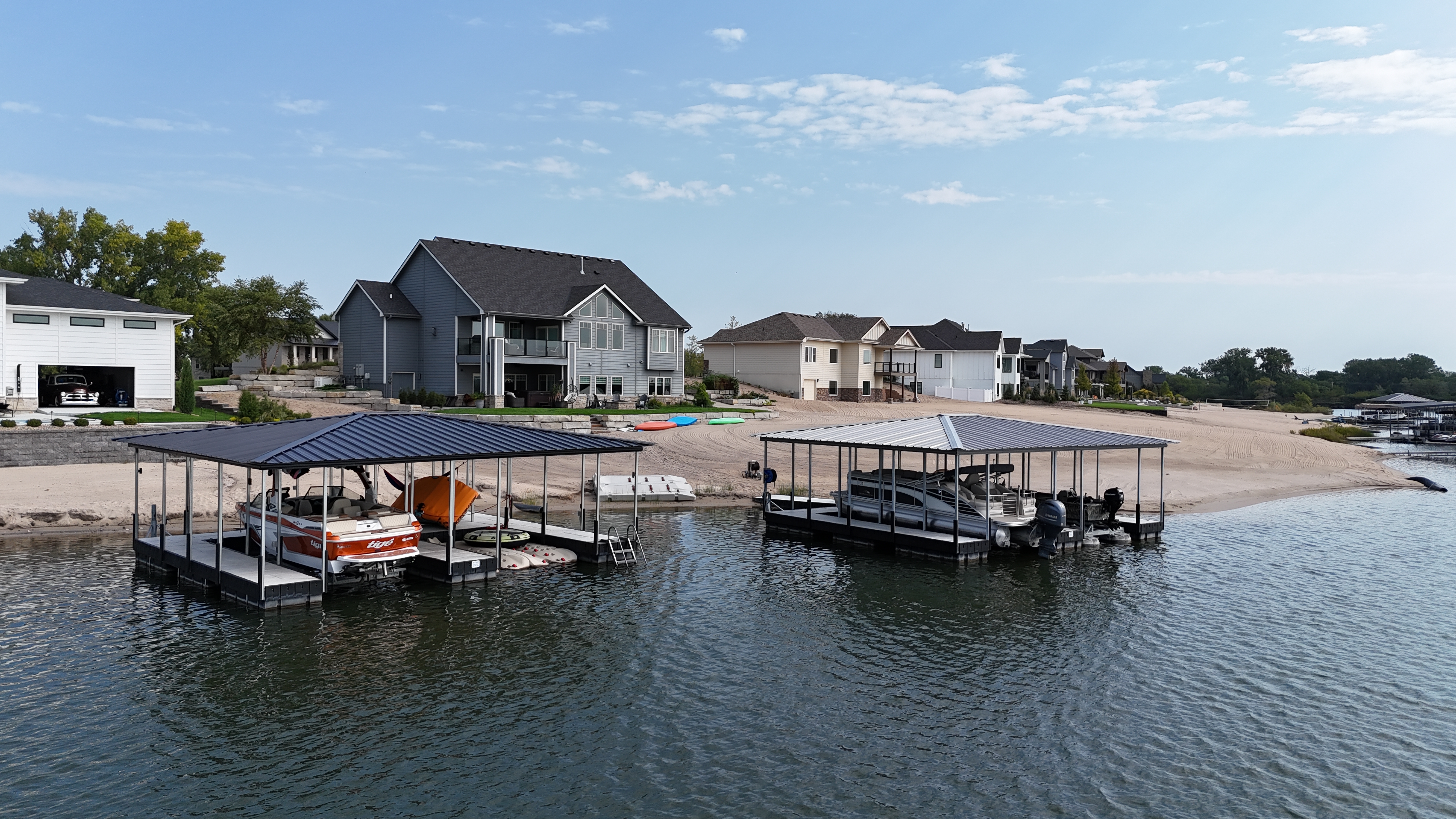 Covered Boat Lift & Dock Installation on Residential Lakefront