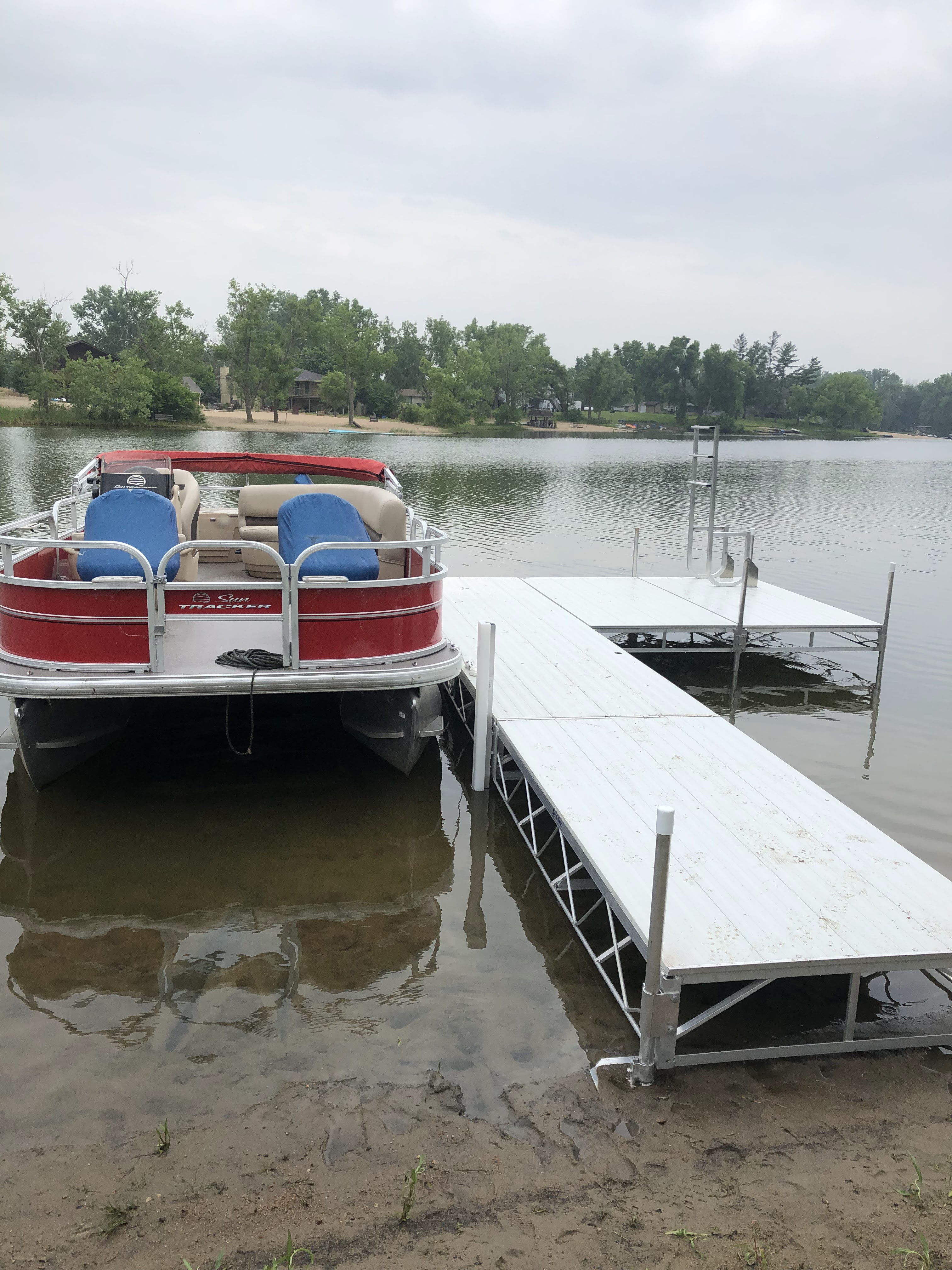 Pontoon Boat Docked at New Aluminum Dock Installation