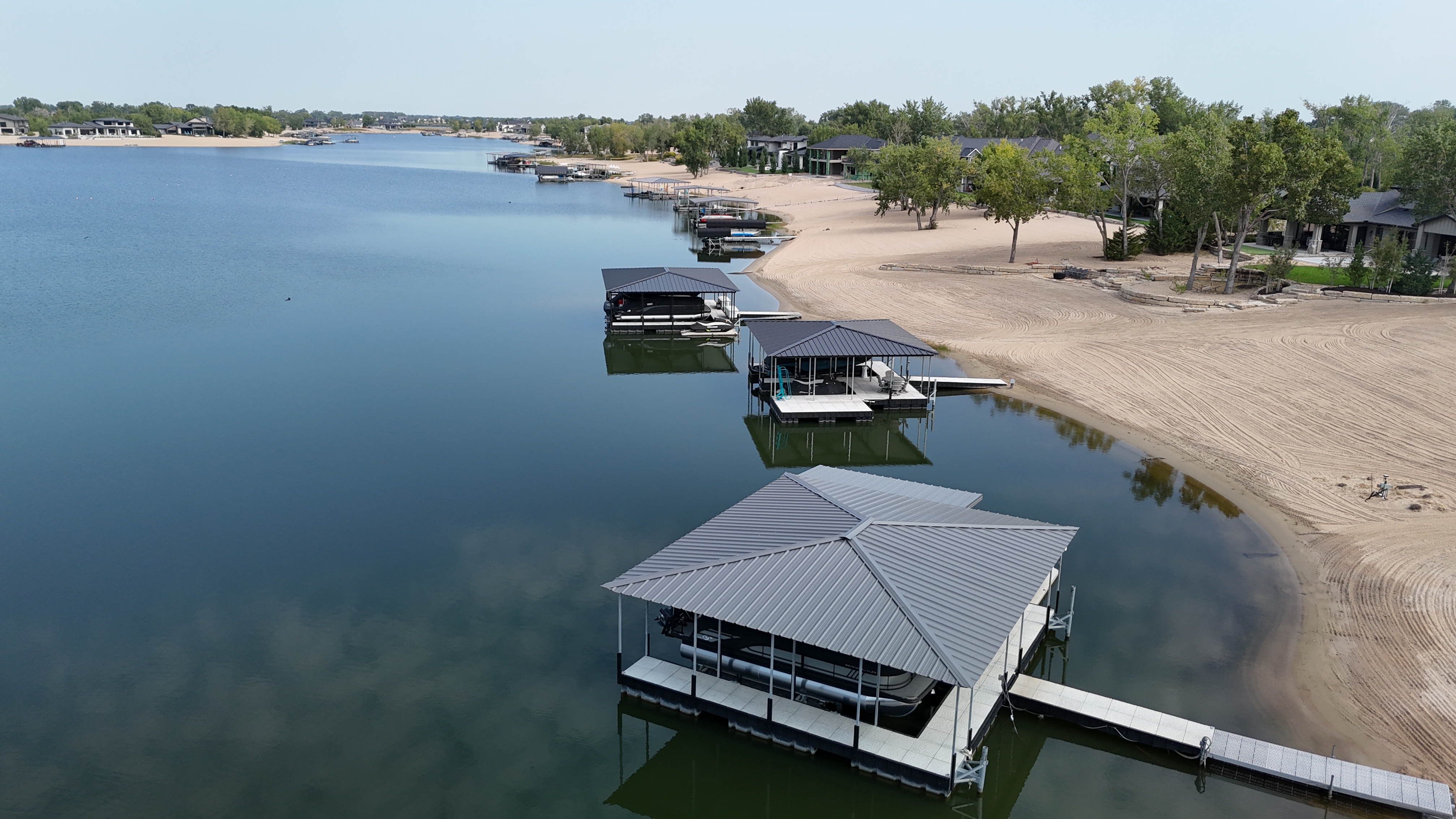 Covered Boat Lift Docks on Lakefront Shoreline