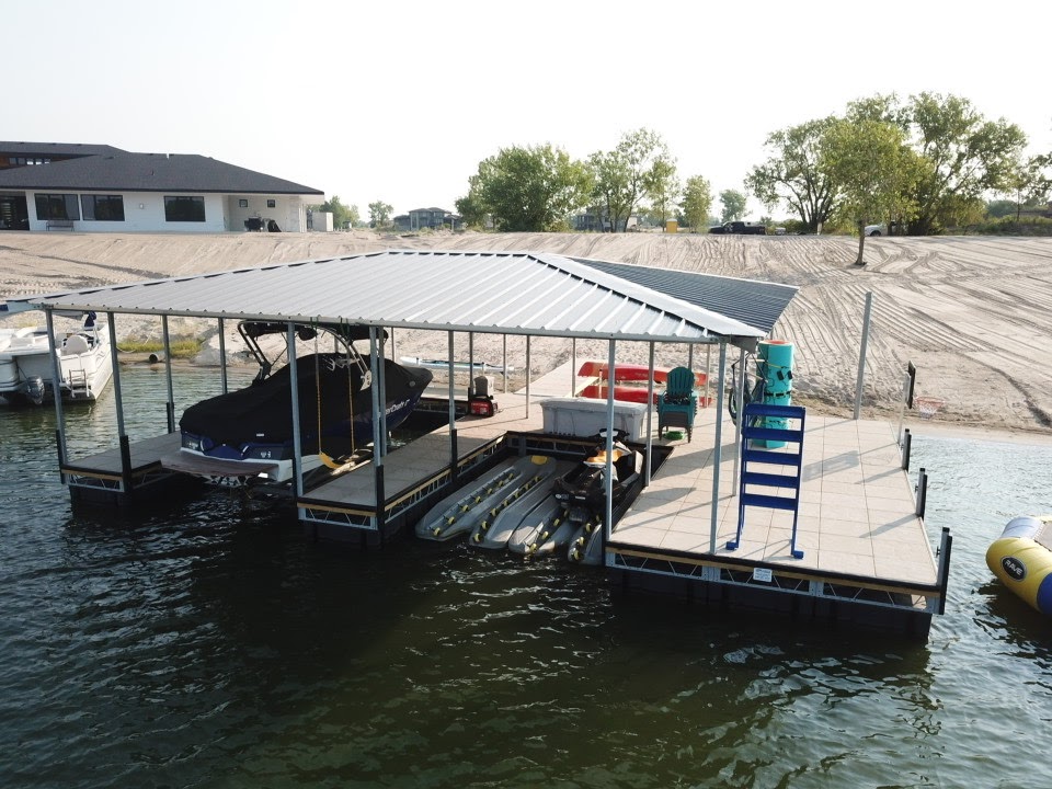 Covered Floating Dock with Boat Lift & PWC Ports