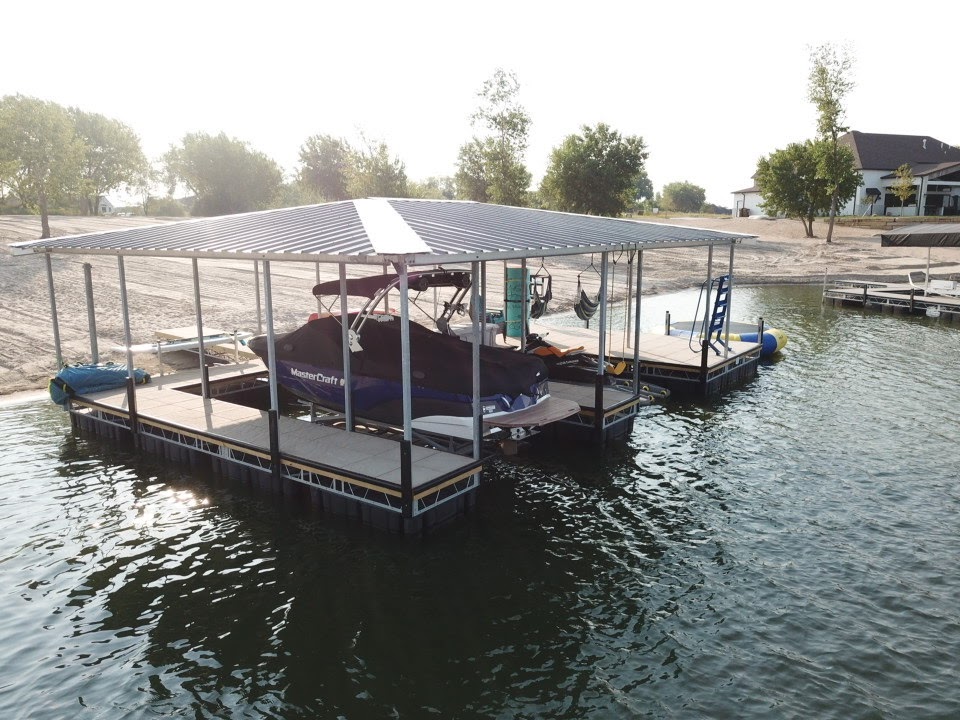 Covered Floating Dock with Boat Lift Installation