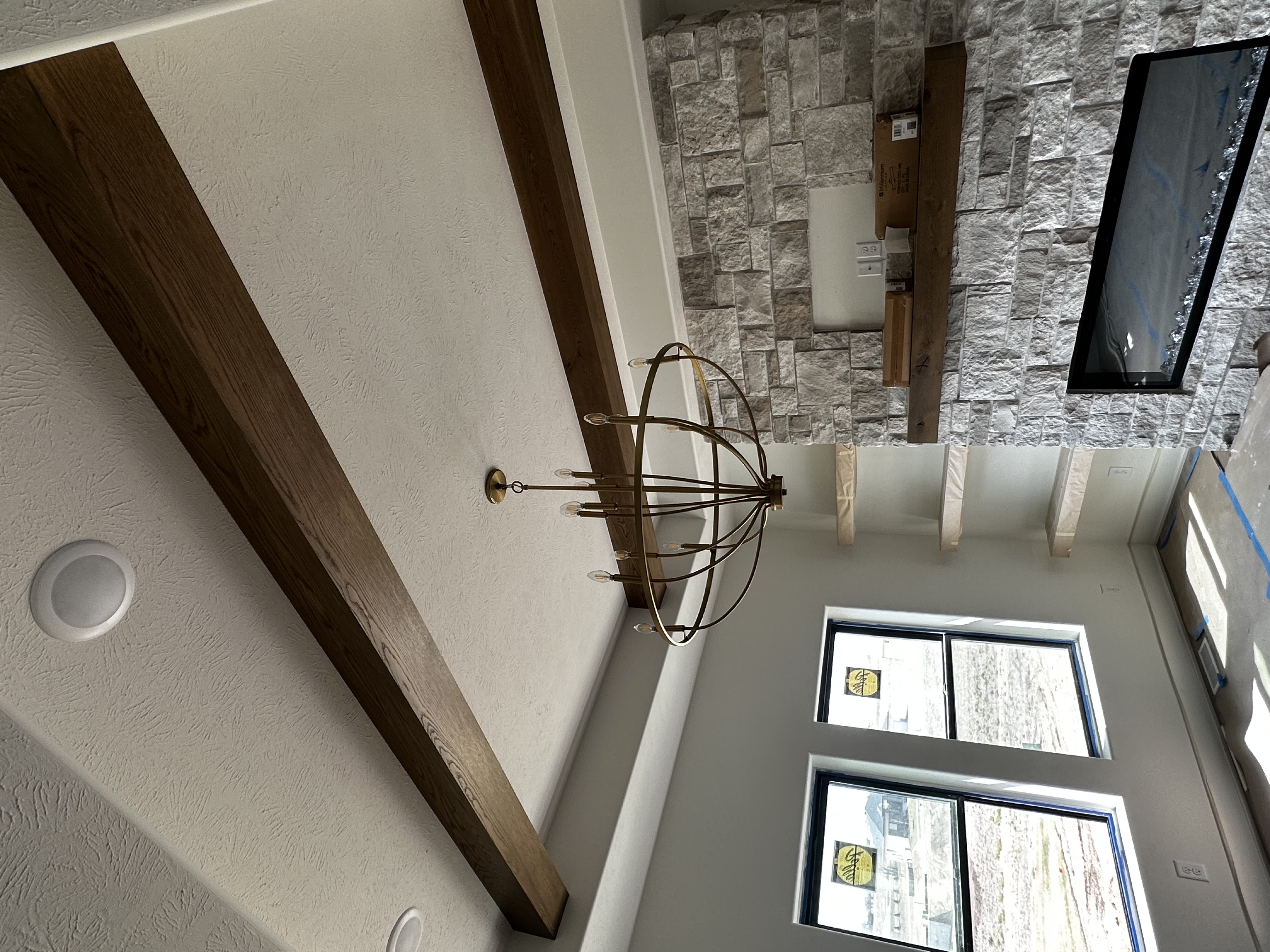 Ceiling Beam & Wood Mantel Installation – New Build Living Room