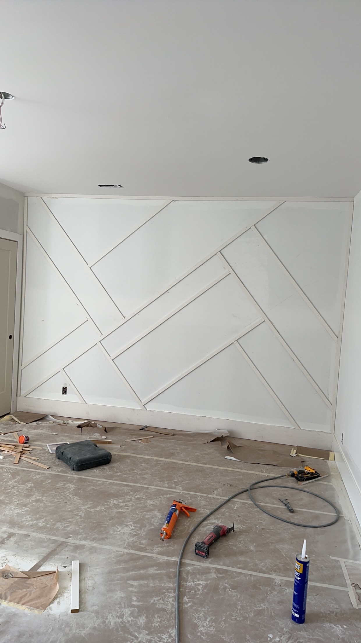Geometric Diagonal Board & Batten Accent Wall Installation