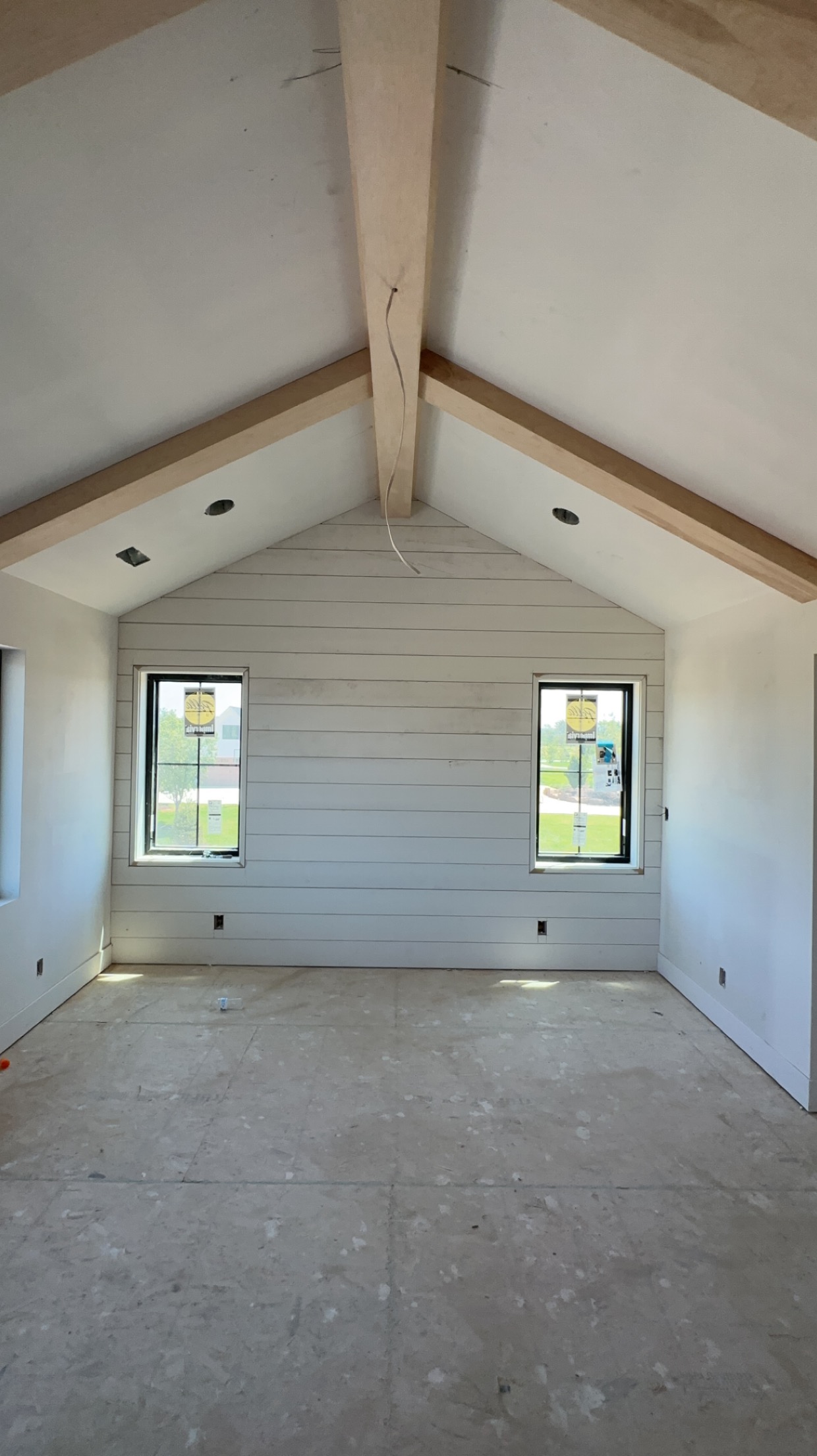 Vaulted Ceiling Beams & Shiplap Accent Wall