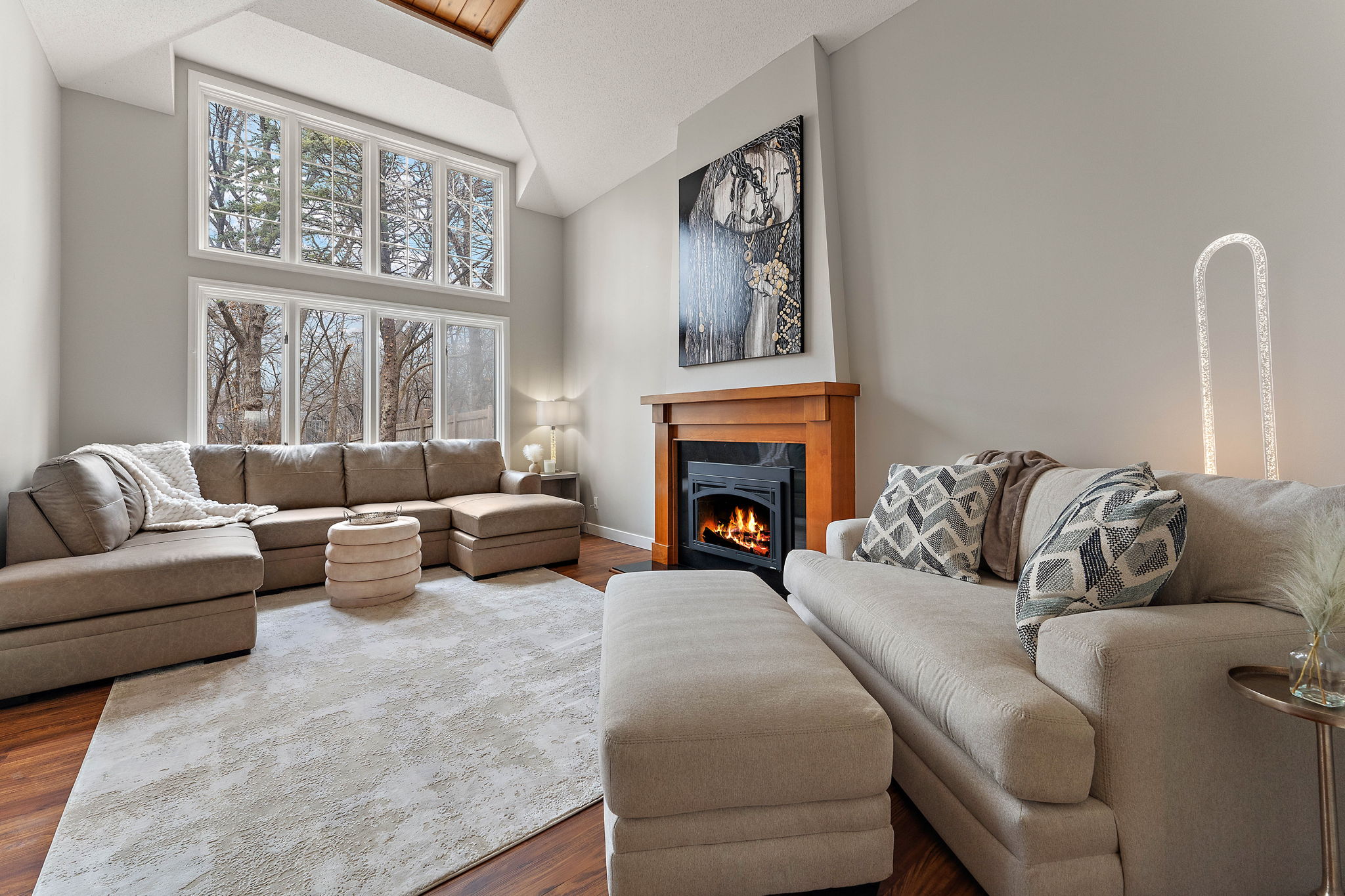 Spotless Living Room with Fireplace & Vaulted Ceilings