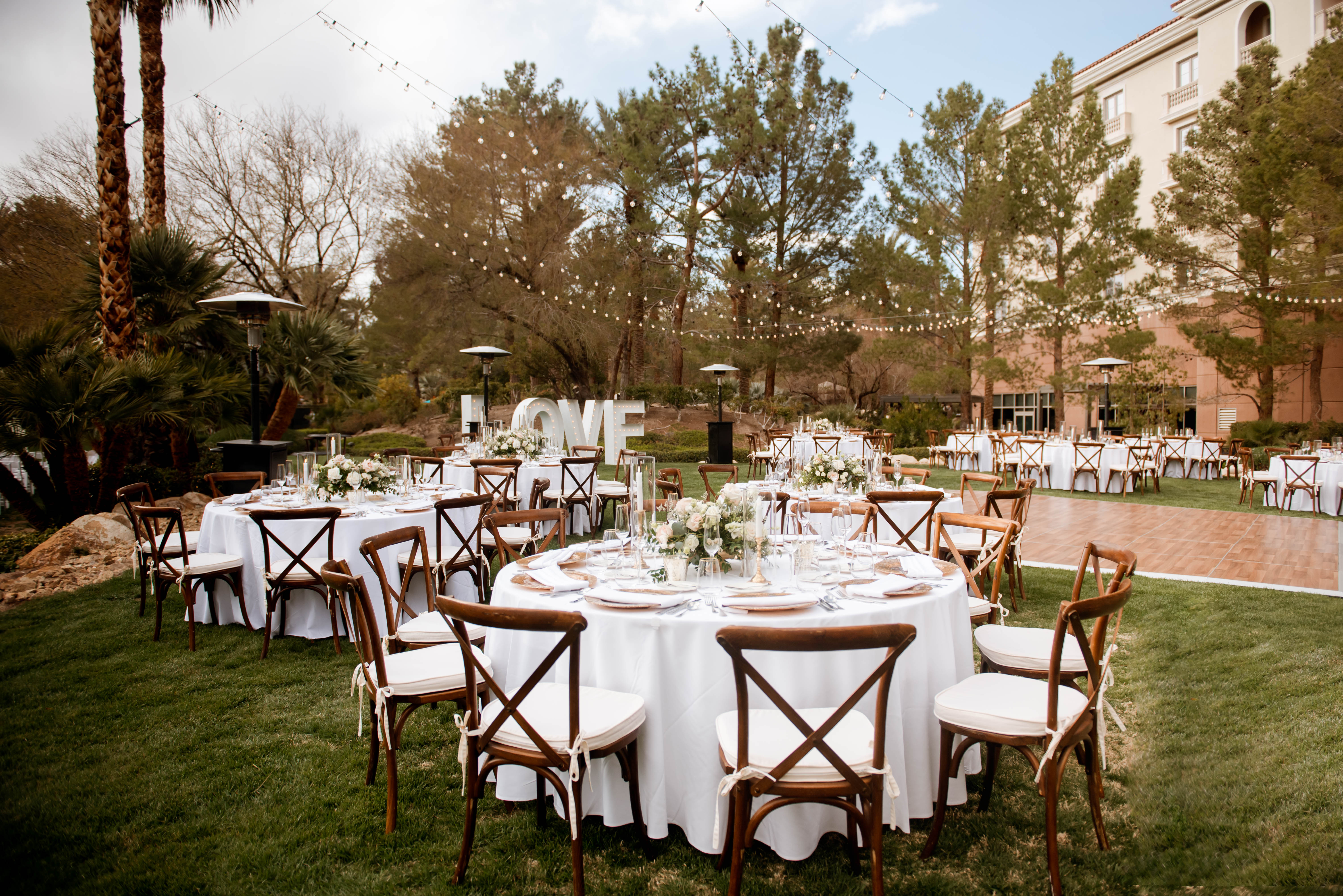 Outdoor Wedding Reception Setup with Garden Elegance