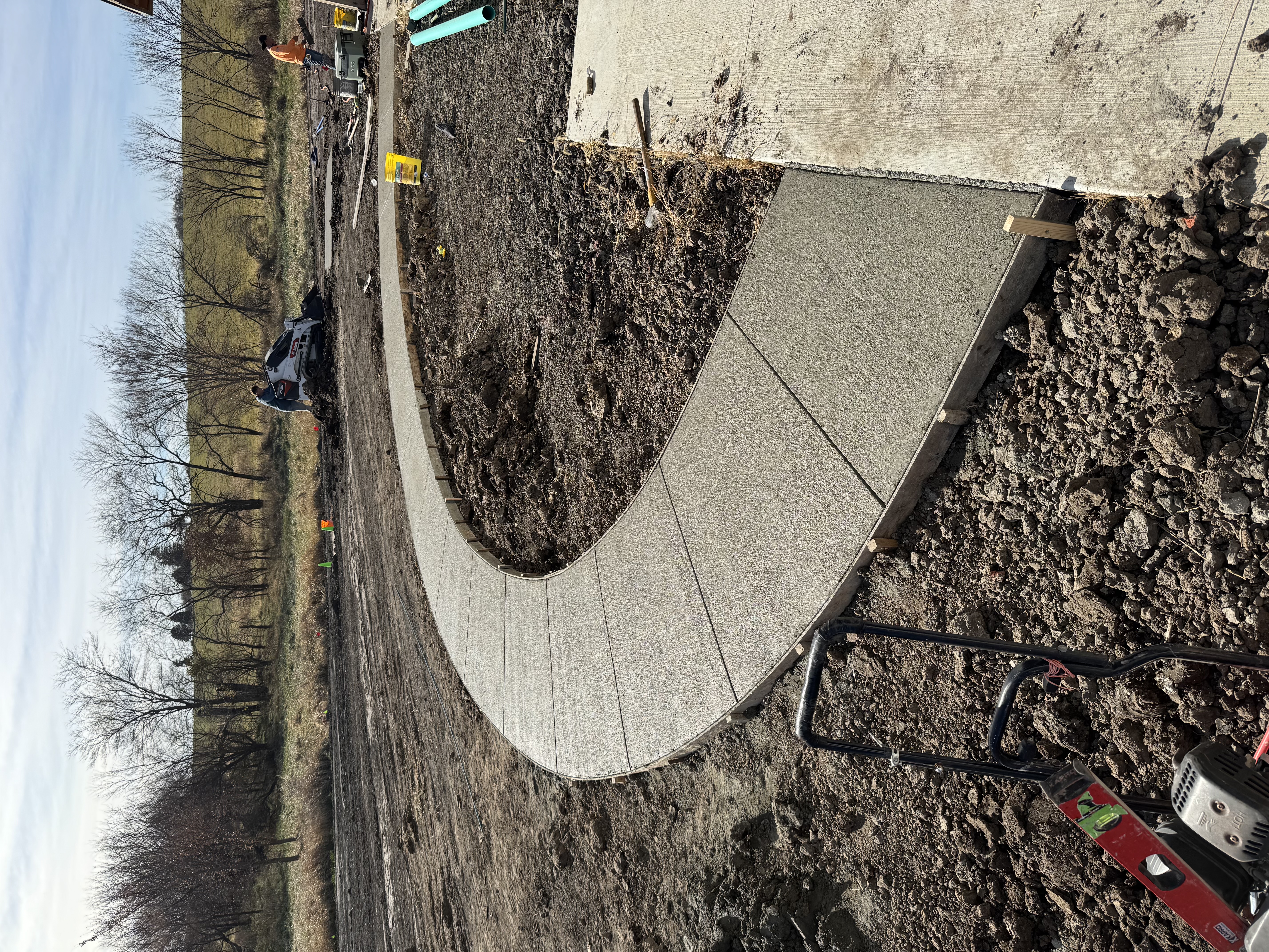 Curved Concrete Walkway Installation in Progress