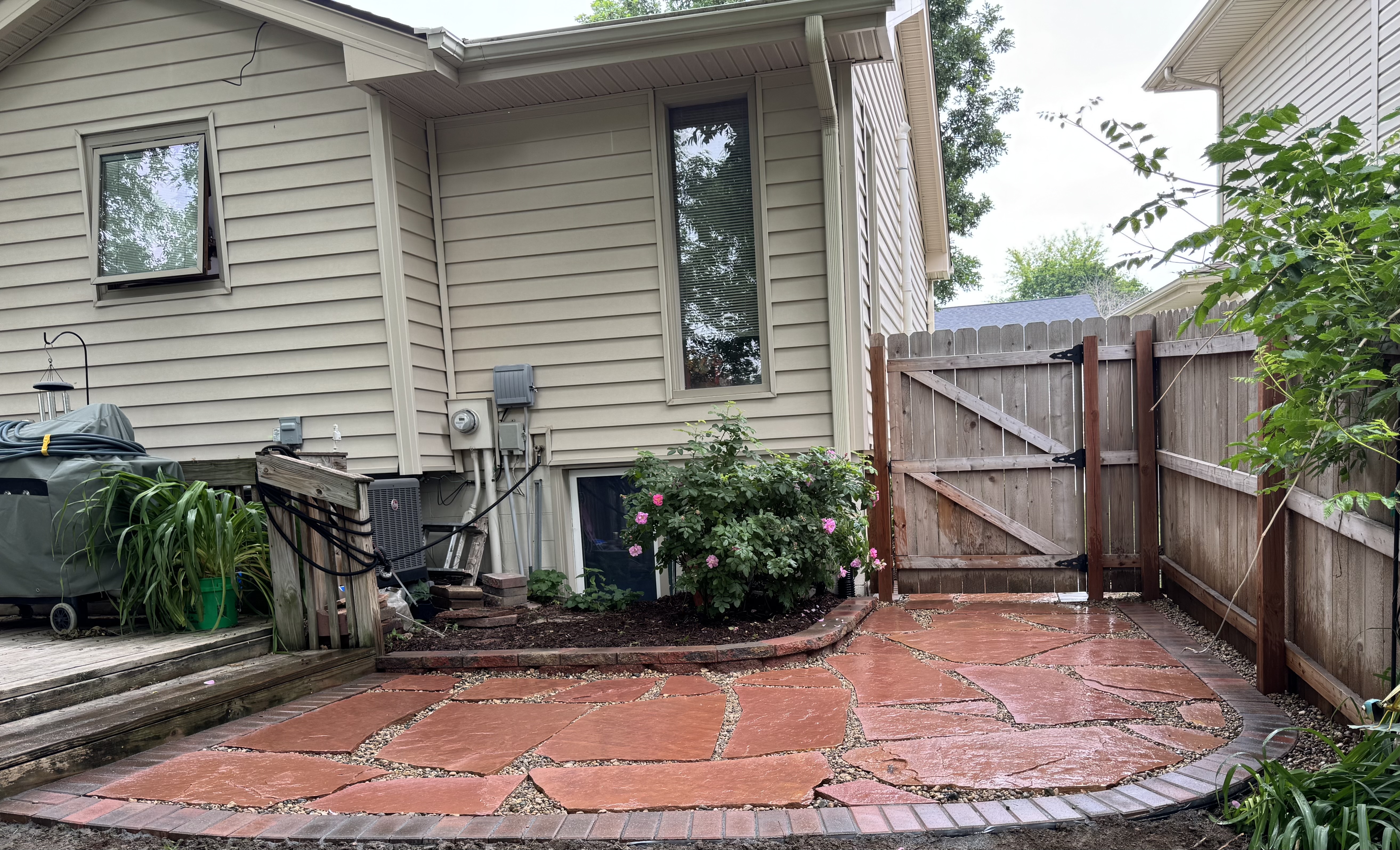 Custom Flagstone Patio with Brick Border