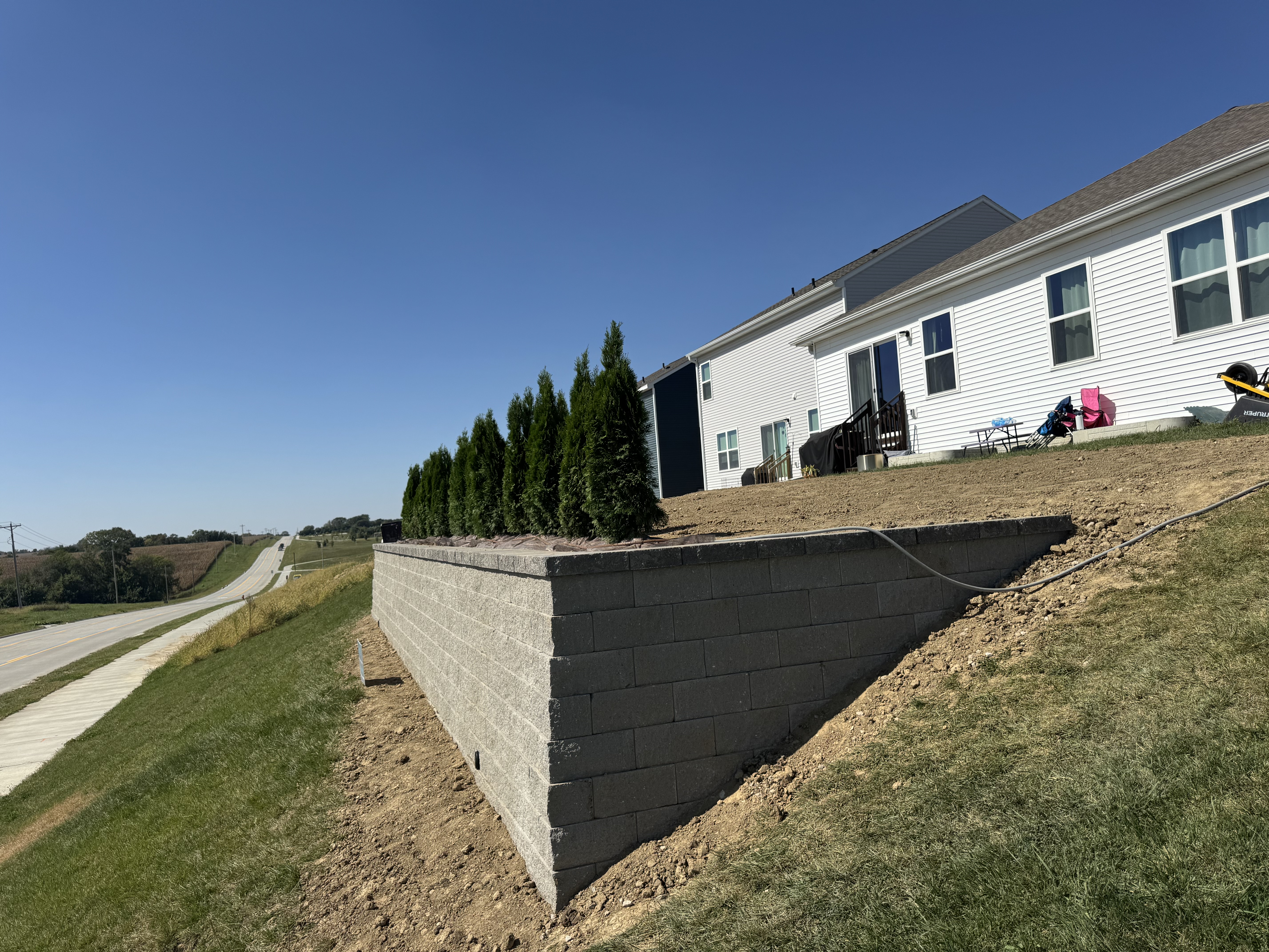 Block Retaining Wall with Landscaped Planting Bed