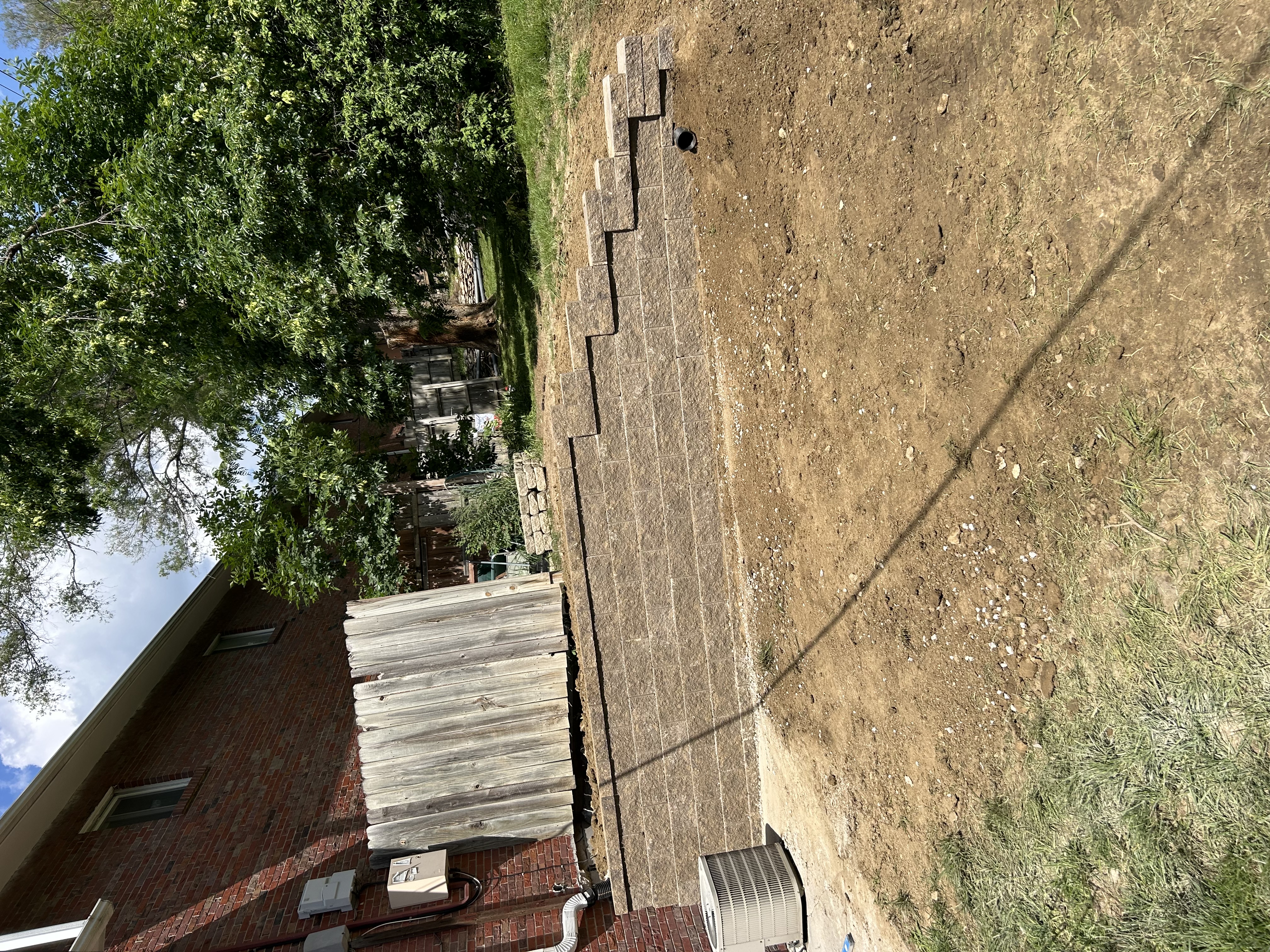 Block Retaining Wall with Steps and Grading