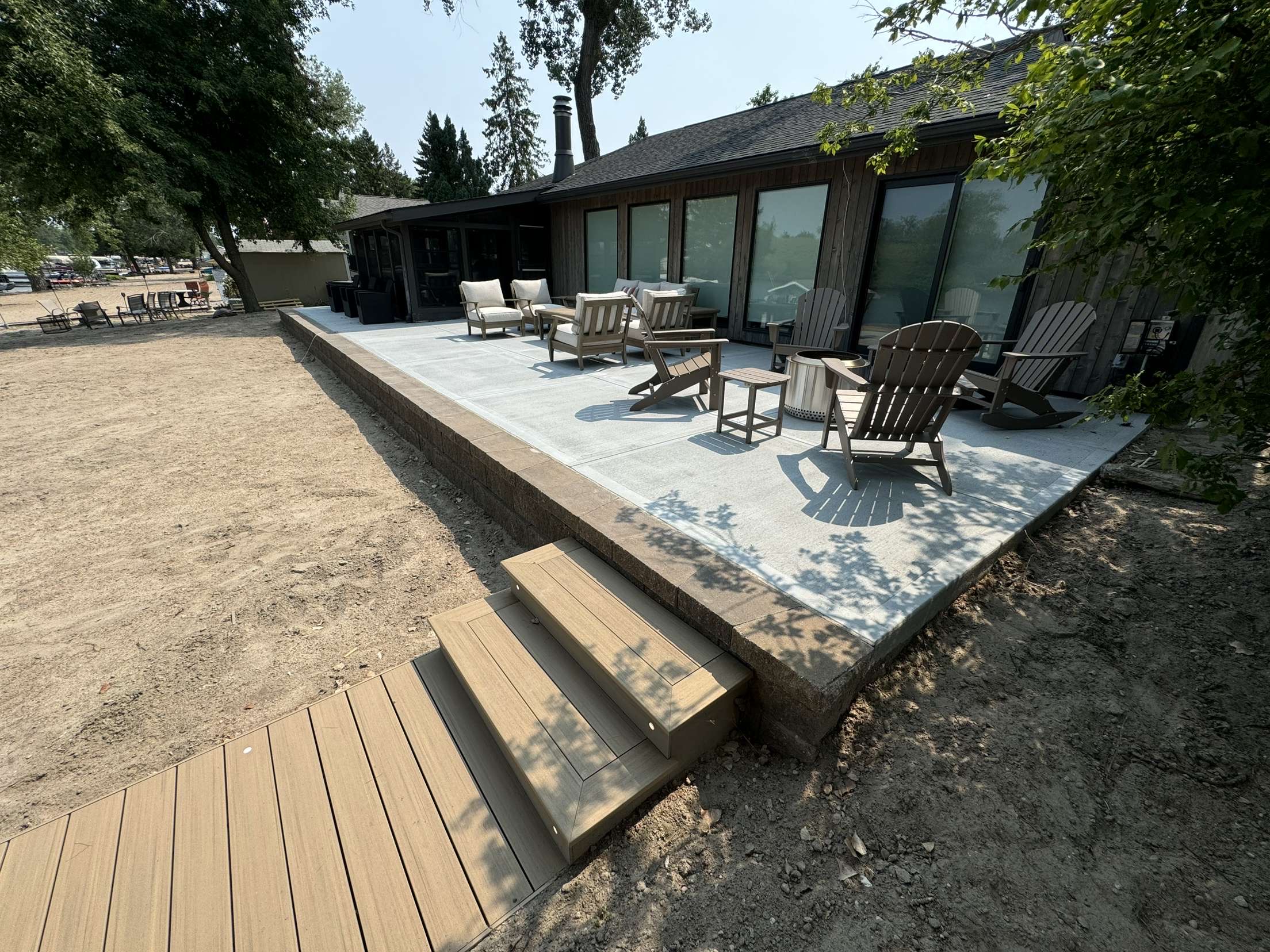 Lakeside Concrete Patio with Block Retaining Wall & Composite Steps