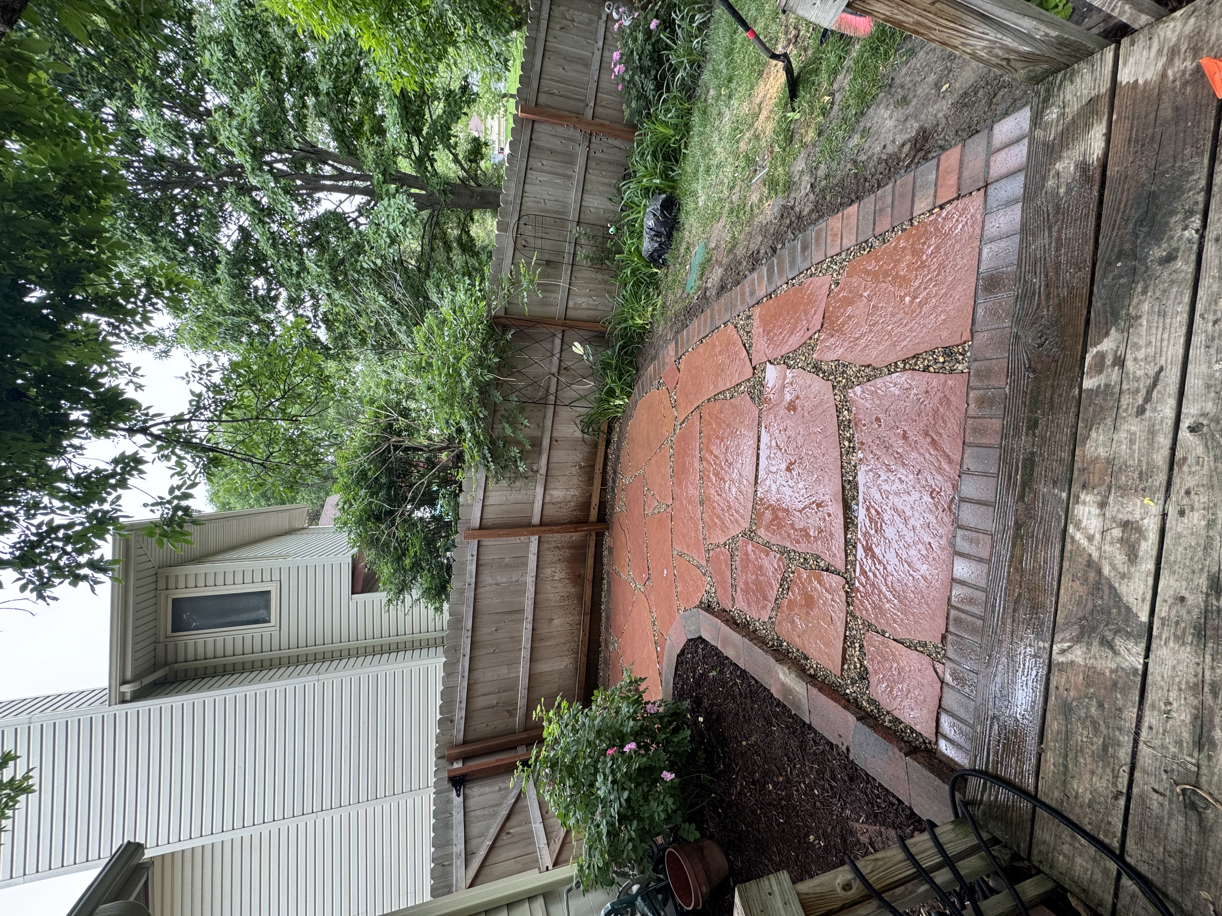 Custom Flagstone Patio with Brick Border Installation