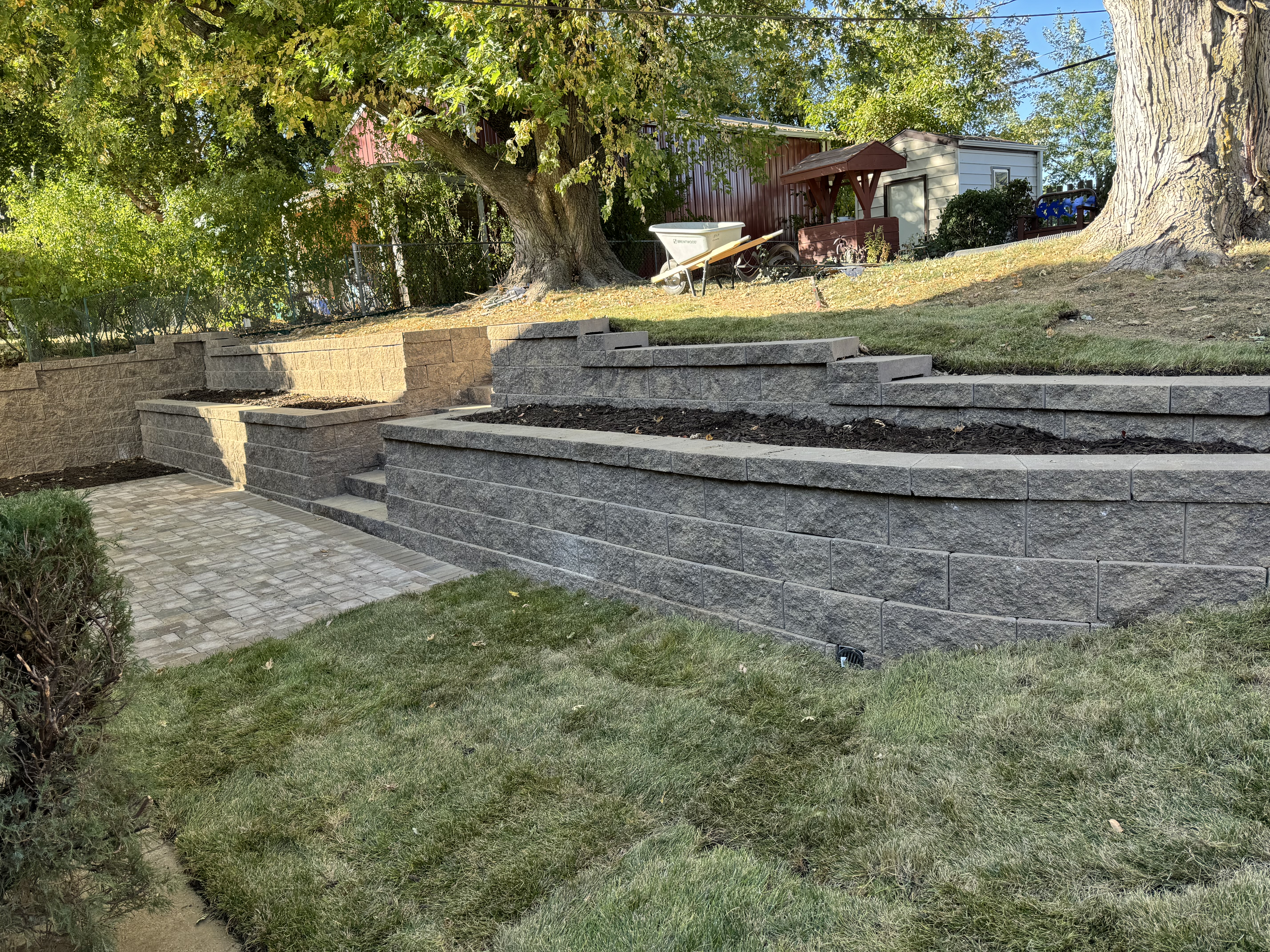 Multi-Tiered Block Retaining Walls with Paver Walkway