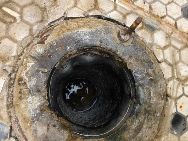 Corroded Floor Drain Inspection & Cleaning