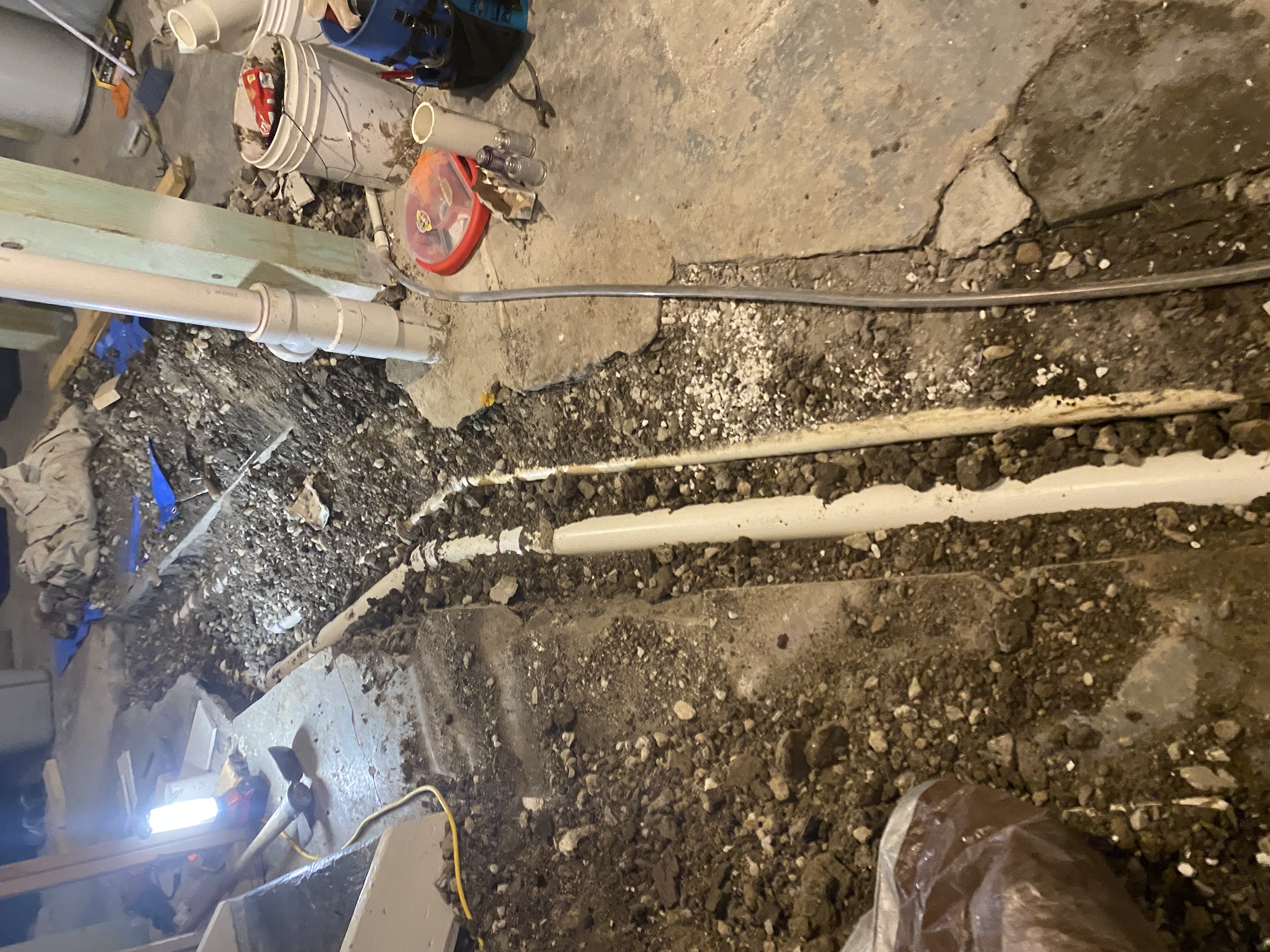 Basement Floor Excavation & Underground PVC Drain Line Installation