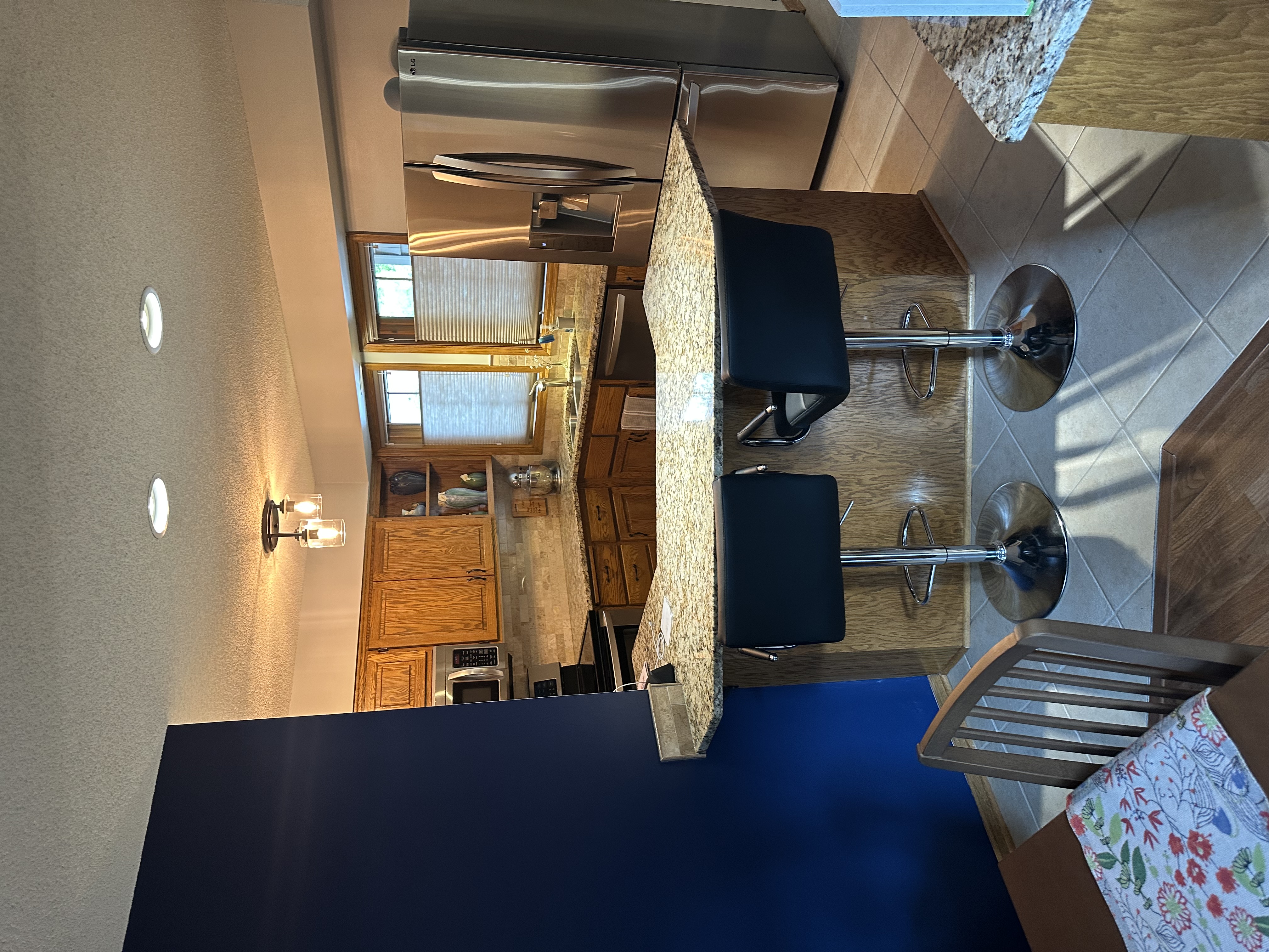 Kitchen Interior Painting with Bold Navy Accent Wall