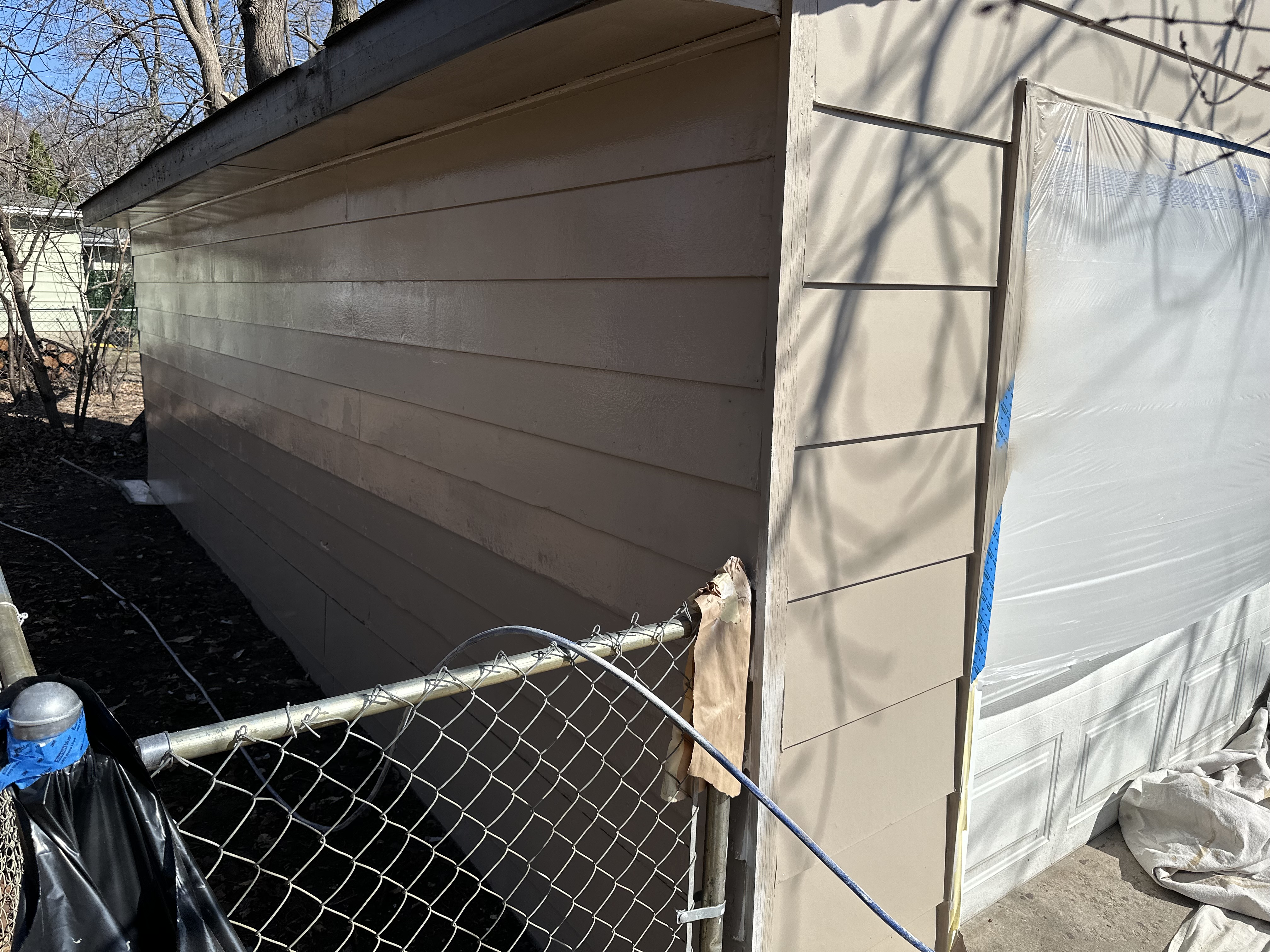 Exterior Siding Painting with Professional Masking