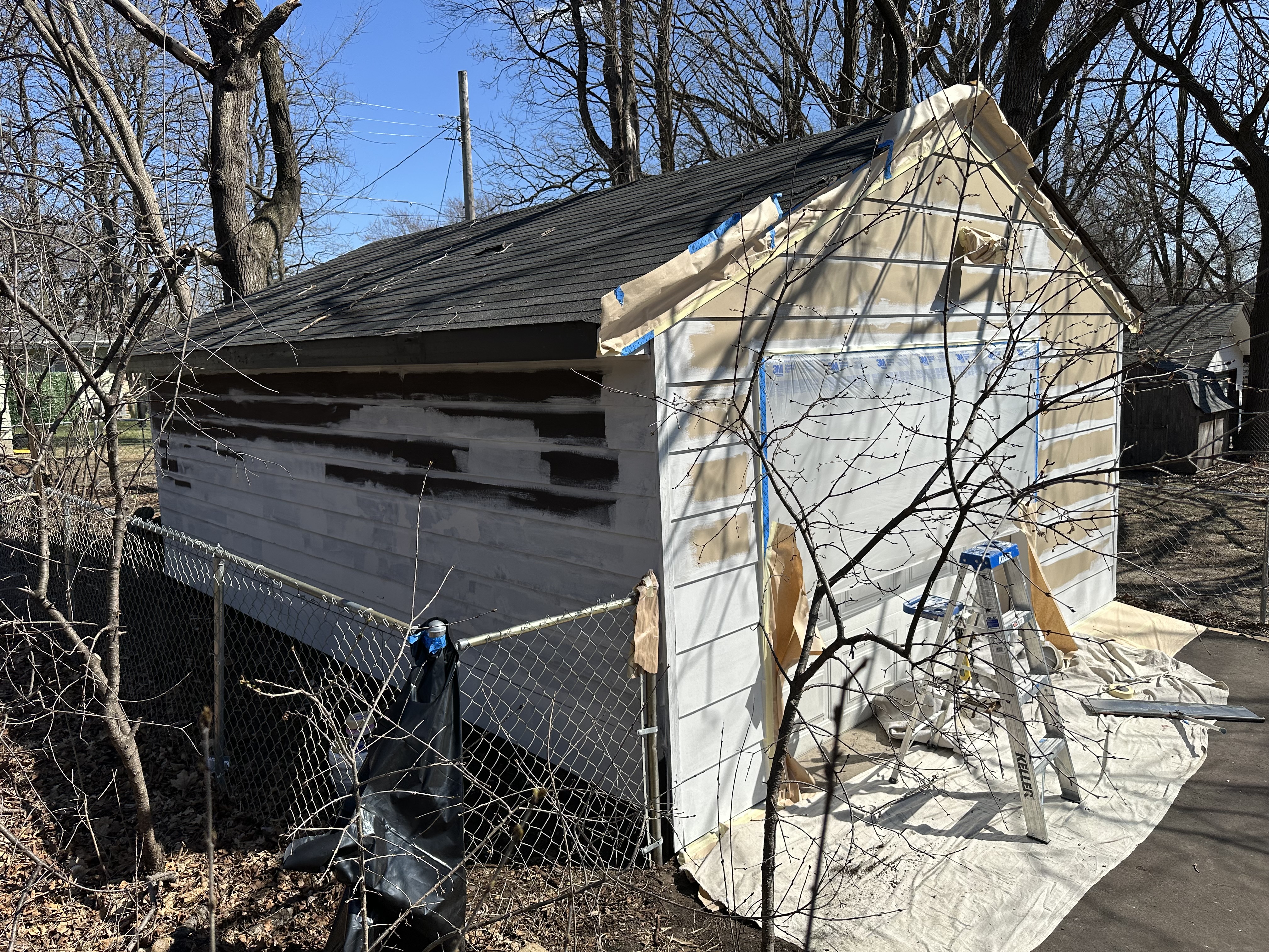 Exterior Shed Renovation & Painting in Progress