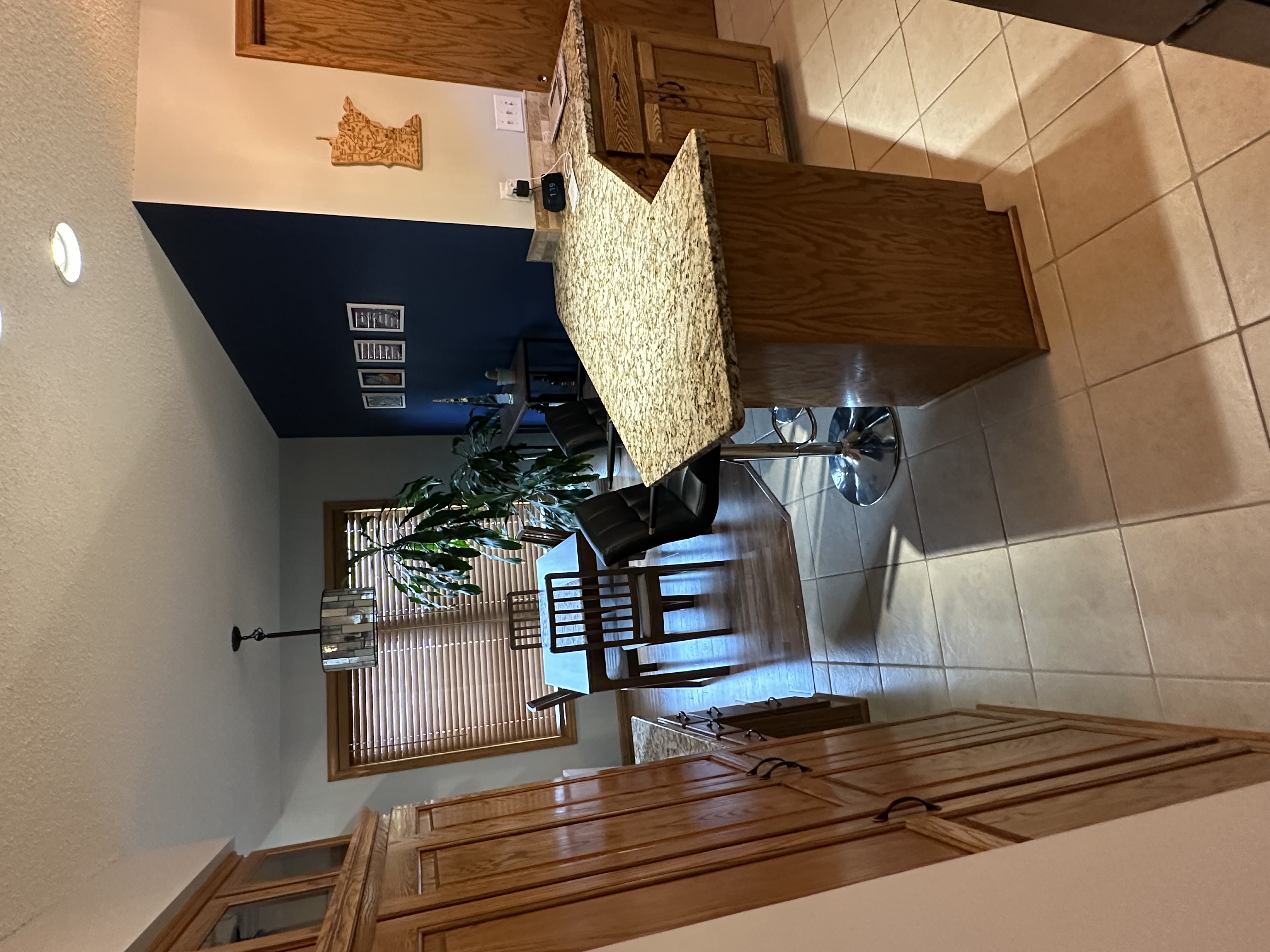 Kitchen & Dining Room Interior Painting – Accent Wall & Cabinetry
