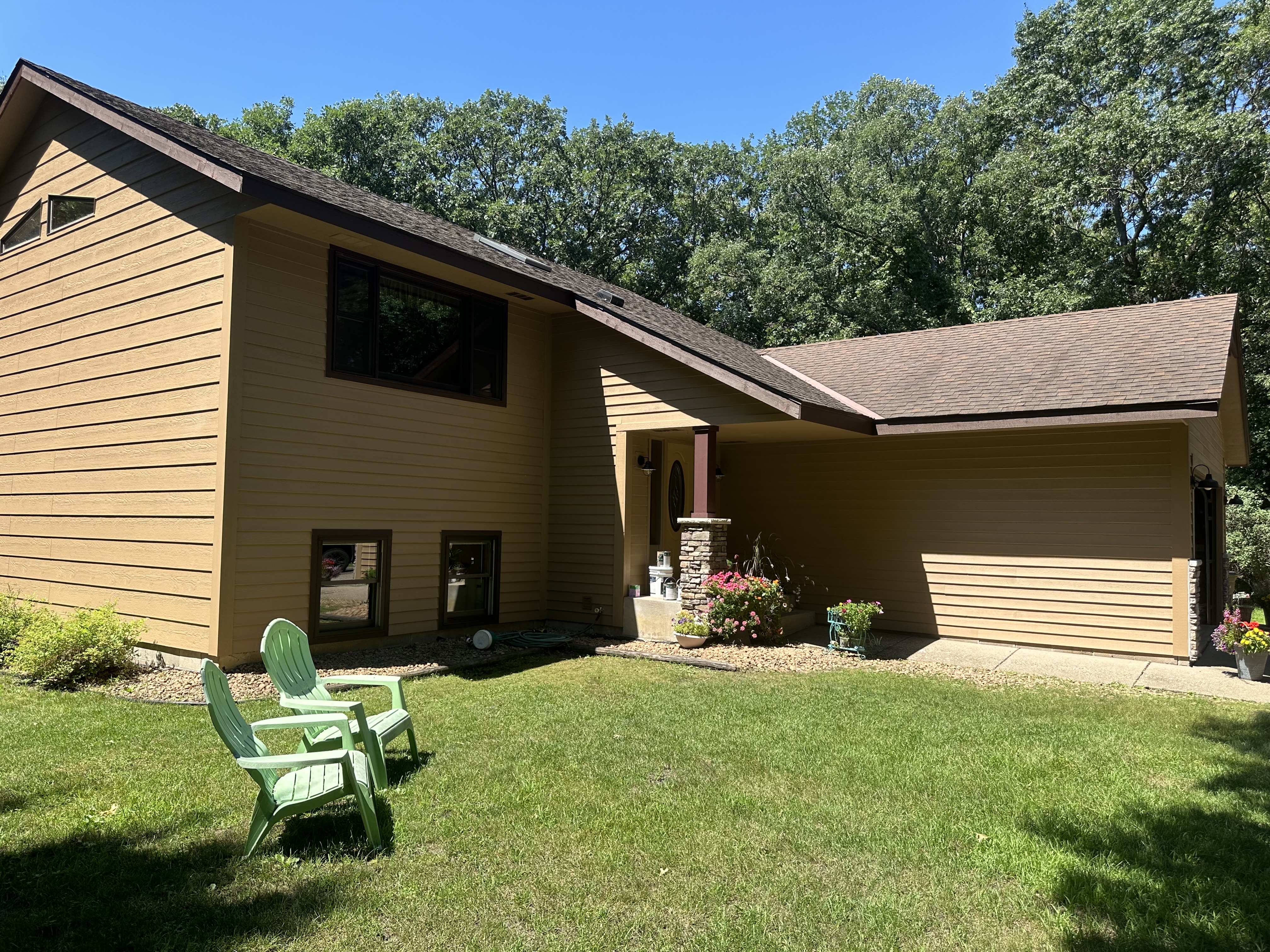 Exterior Home Painting – Tan Siding with Dark Trim Finish