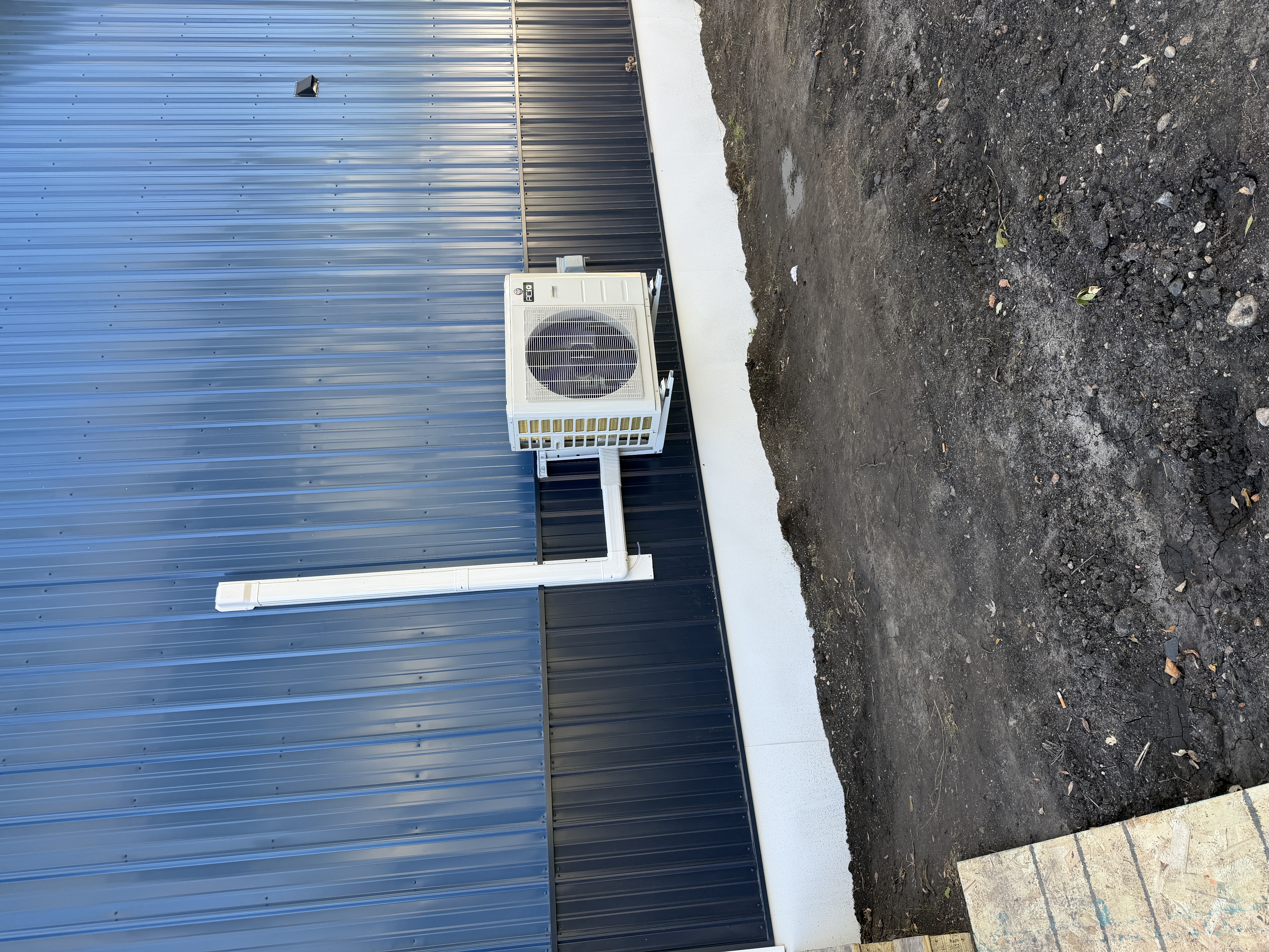 Mini-Split Outdoor Condenser Installation on Commercial Metal Building