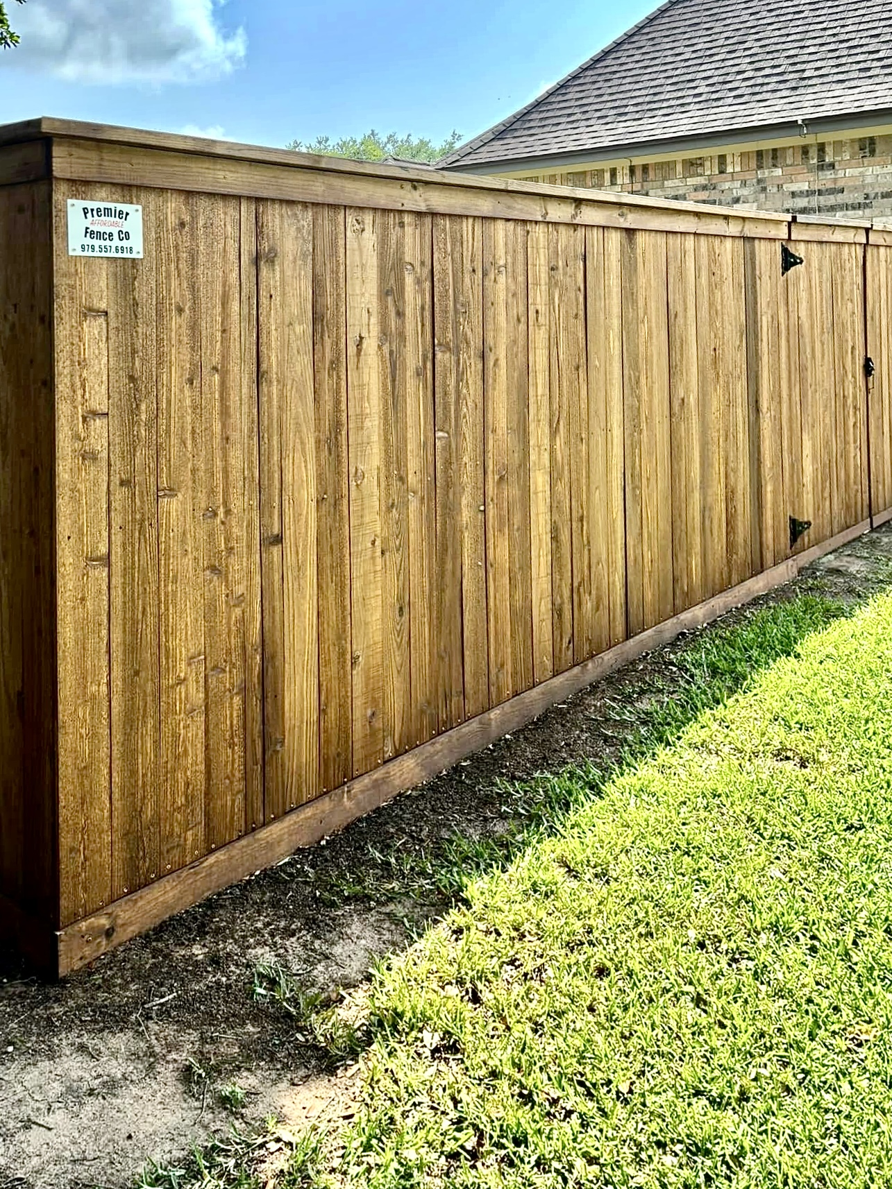 Premier Fence Co Angleton. Wood Privacy fence. Stained Cedar.jpg