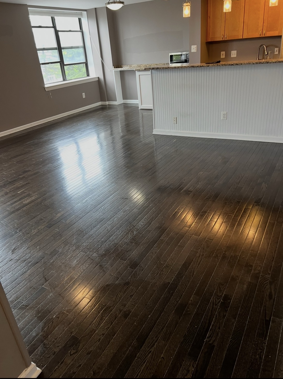 Dark Hardwood Floor Cleaning – Open-Concept Living Space