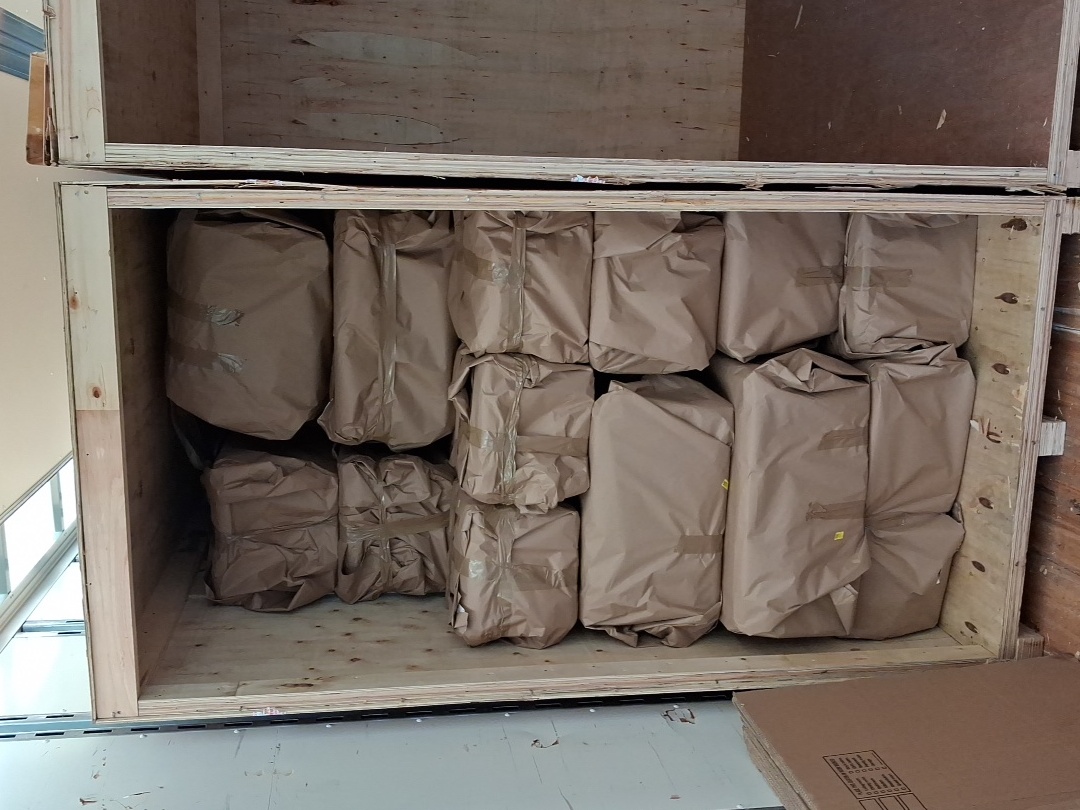 Fully Loaded Moving Crate with Wrapped Items